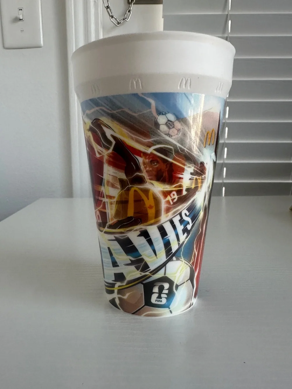 McDonald's 2026 FIFA World Cup collectible cup featuring Alphonso Davies
